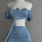 A sexy and fashionable two-piece short skirt with hollowed-out pleated puffed sleeves that wraps the hips